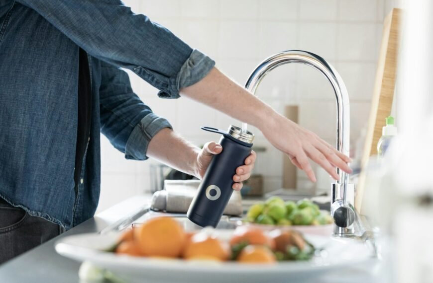Best Under-Sink Water Filter - Clean filtered water flowing from kitchen faucet