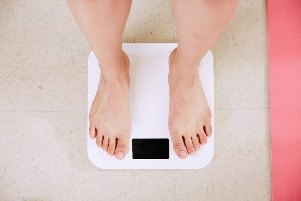 Smart scale on bathroom floor for daily weight tracking