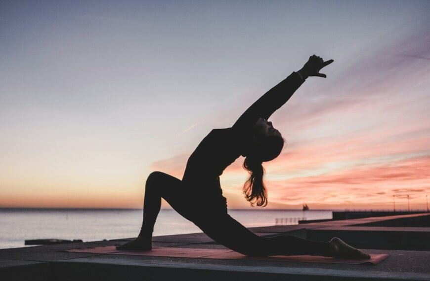 Best Yoga Mat for Yoga. Practitioner in hot yoga class on a grippy mat