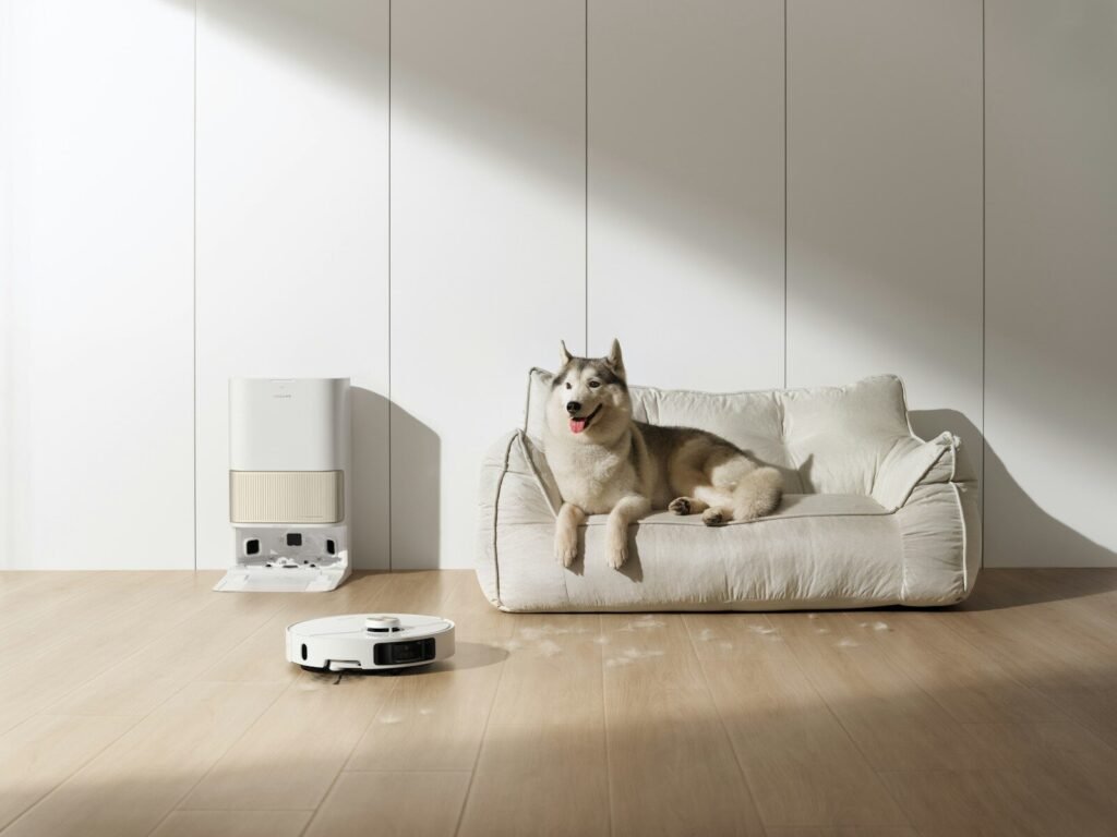 Best Robot Vacuum for Pet Hair - Robot vacuum cleaning pet hair on hardwood floor