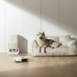 Best Robot Vacuum for Pet Hair - Robot vacuum cleaning pet hair on hardwood floor